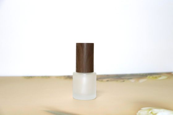 20 مل قوارير تجميلية خالية قابلة لإعادة التعبئة من الزجاج المتجمد مع غطاء مسدس